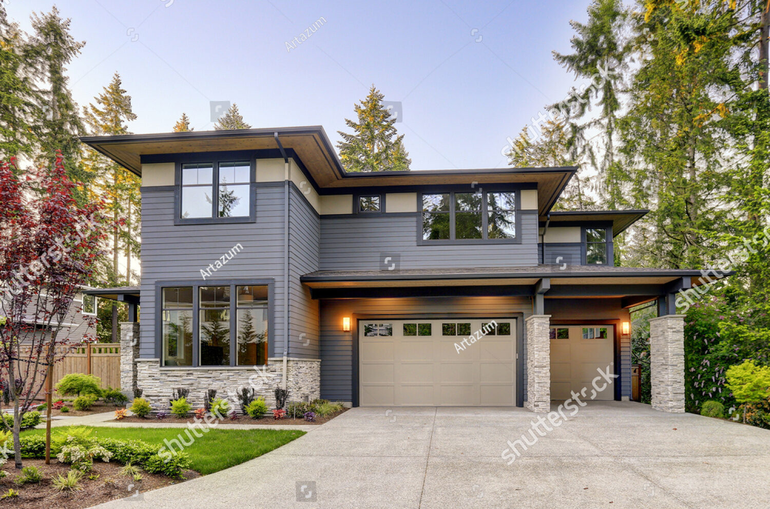 stock-photo-new-construction-home-exterior-with-contemporary-house-plan-features-gray-wood-siding-stone-719378770